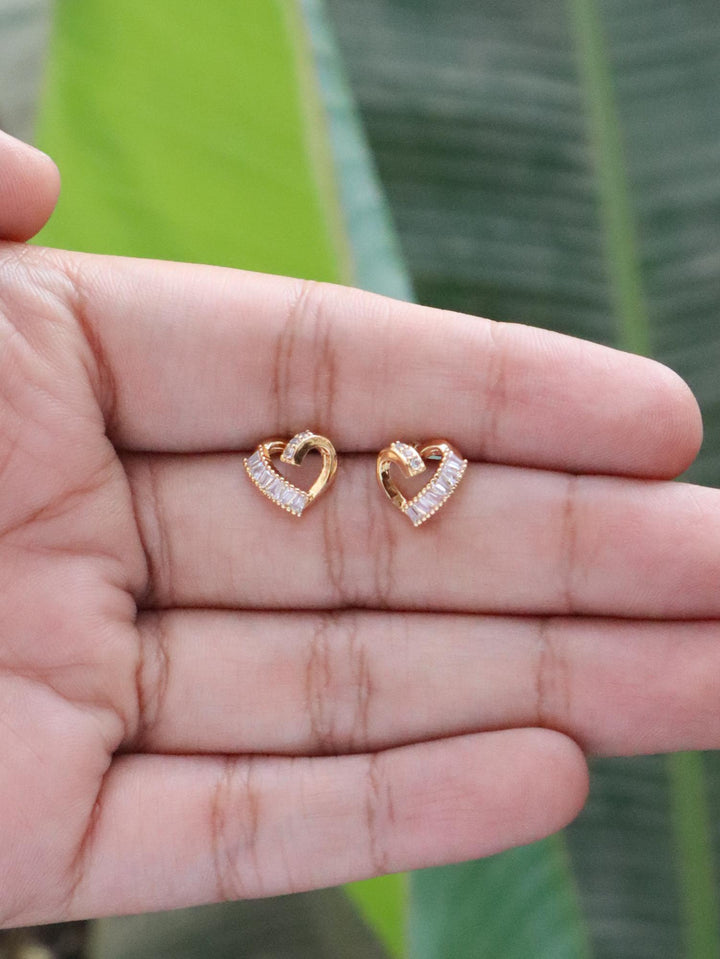 18K Gold Diamond Heart Earrings - by Live Some India in just 18K Gold Diamond Heart Earrings by Live Some India on hands