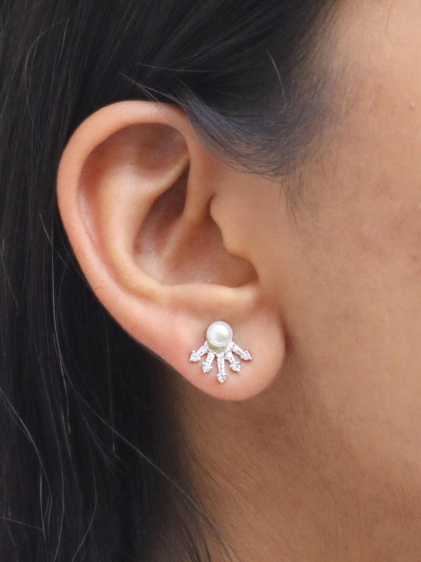 A closeup image of a girl wearing Dazz Pearl Earrings -1 by Live Some India