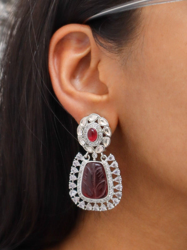 A closeup image of a girl wearing Dazzling Diamond Earrings by Live Some India 