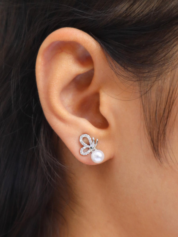 Girl wearing Designer Butterfly with Pearls Diamond Earrings by Live Some India