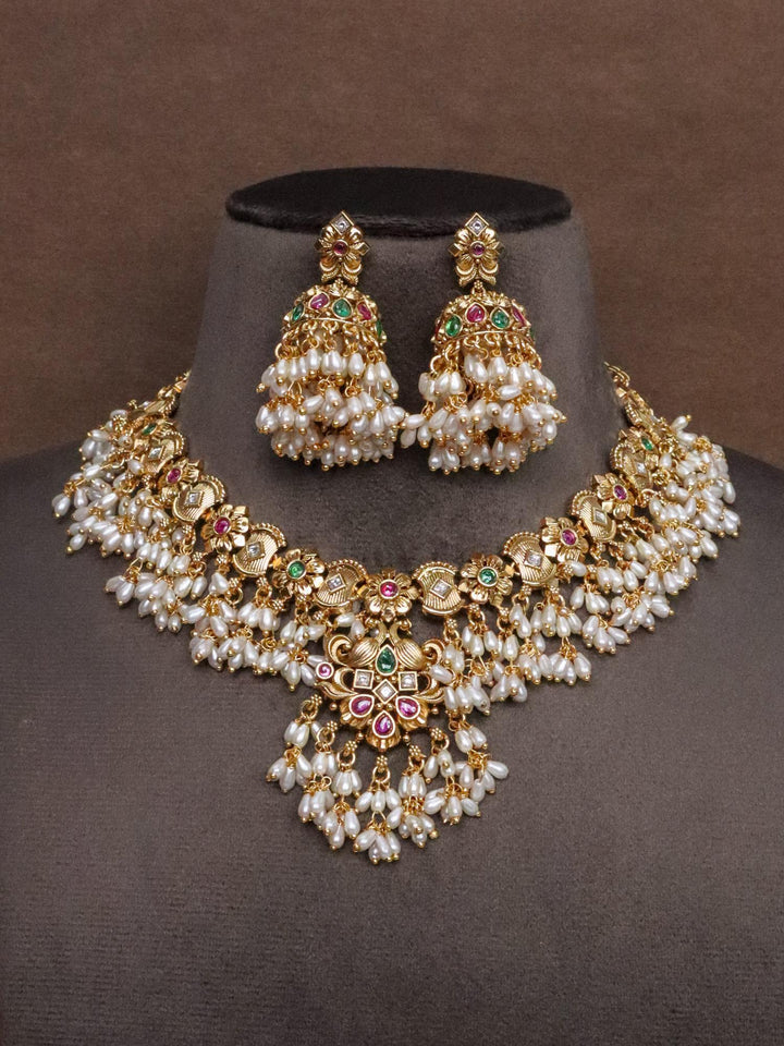 Front image of Designer Temple Necklace Set with Pearl Drops by Live Some India on a brown mannequin