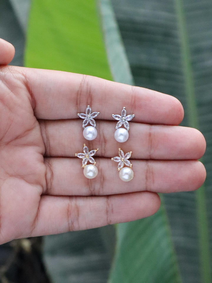 Diamond Flower with Pearl Stud Earrings by Live Some India on hands