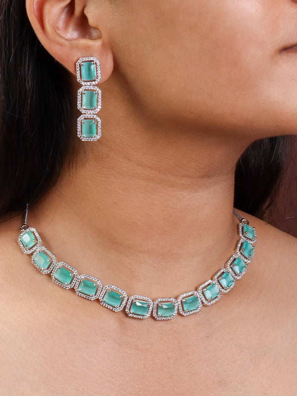 A closeup image of a girl wearing Dreamy Diamond Necklace Set by Live Some India 