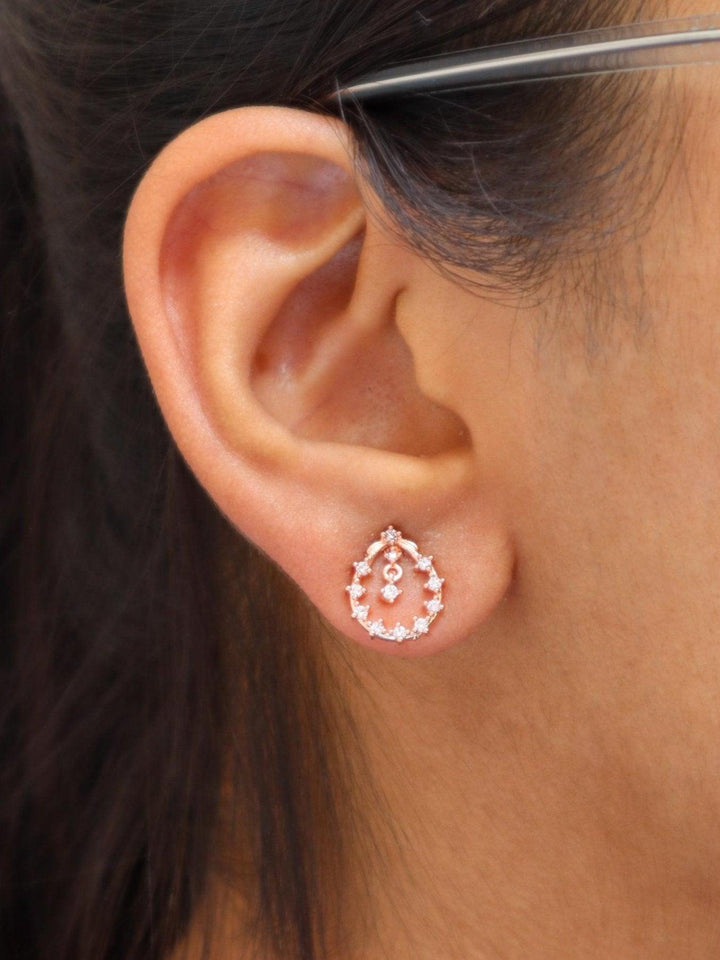 A closeup image of a girl wearing Droplets of Rose Gold Earrings by Live Some India 