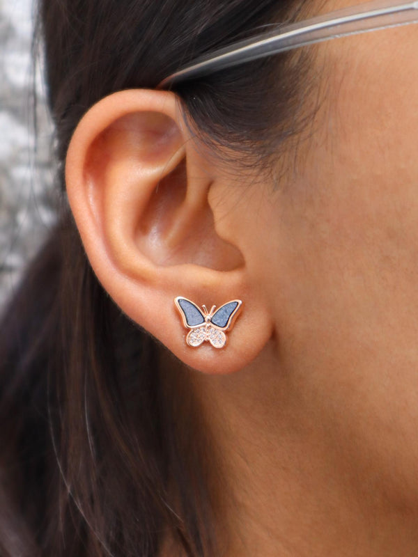 A closeup image of Dual Butterfly Rose Gold Earrings by Live Some India 