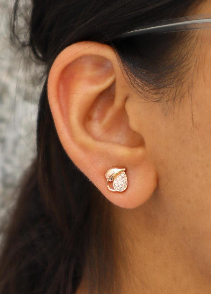 A closeup image of a girl wearing Dual Leaf Earrings -1 by Live Some India 