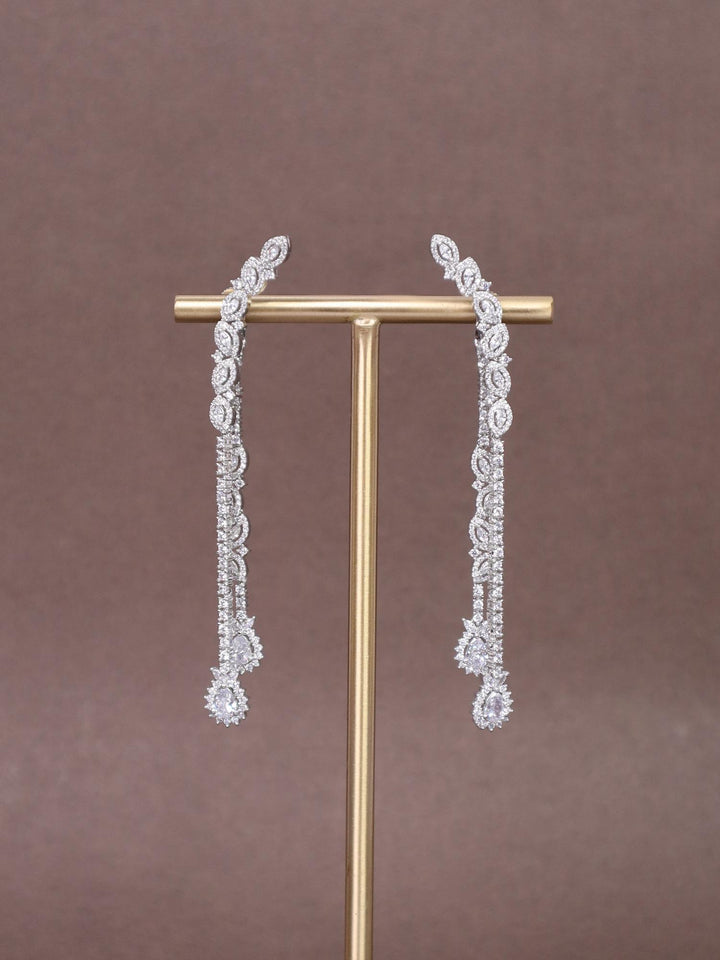 A closeup image of Elated Long Diamond Earrings by Live Some India 