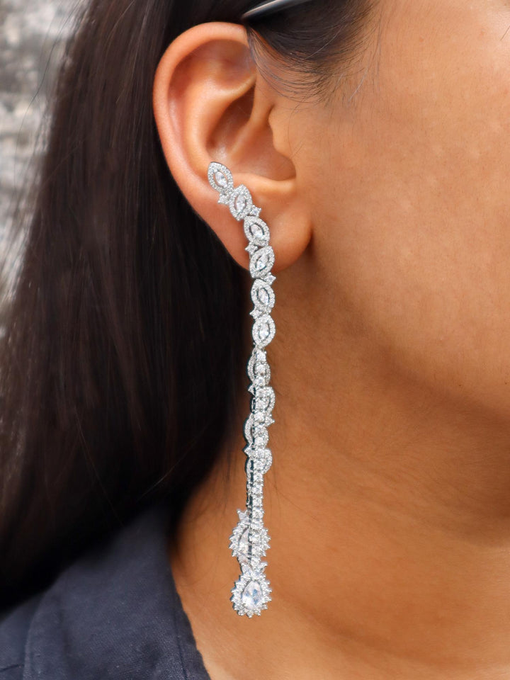 A closeup image of Elated Long Diamond Earrings by Live Some India 