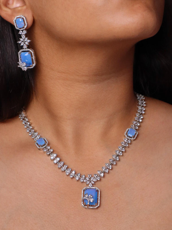 A closeup image of a girl wearing Elegant Blue Diamond Necklace Set -4 by Live Some India 