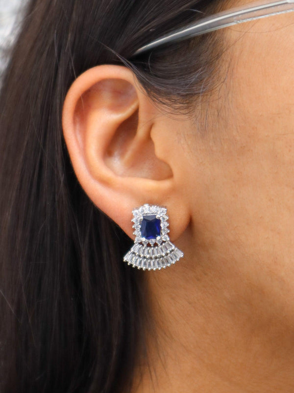 A closeup image of a girl wearing Elegant Stud Diamond Earrings by Live Some India 