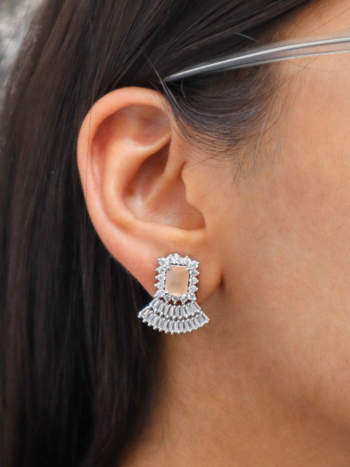 A closeup image of a girl wearing Elegant Stud Diamond Earrings -1 by Live Some India 