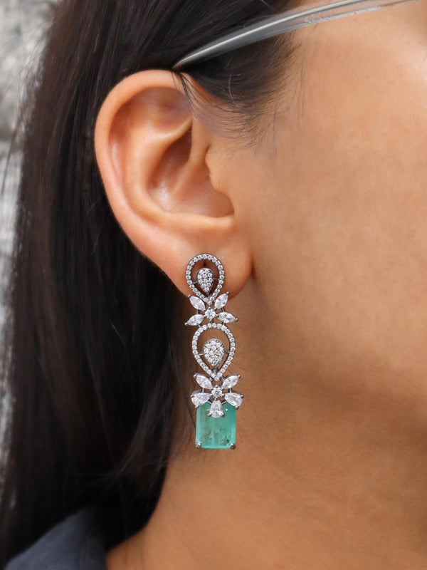 Indian Girl wearing Emerald Doublet Dangle Earrings by Live Some India