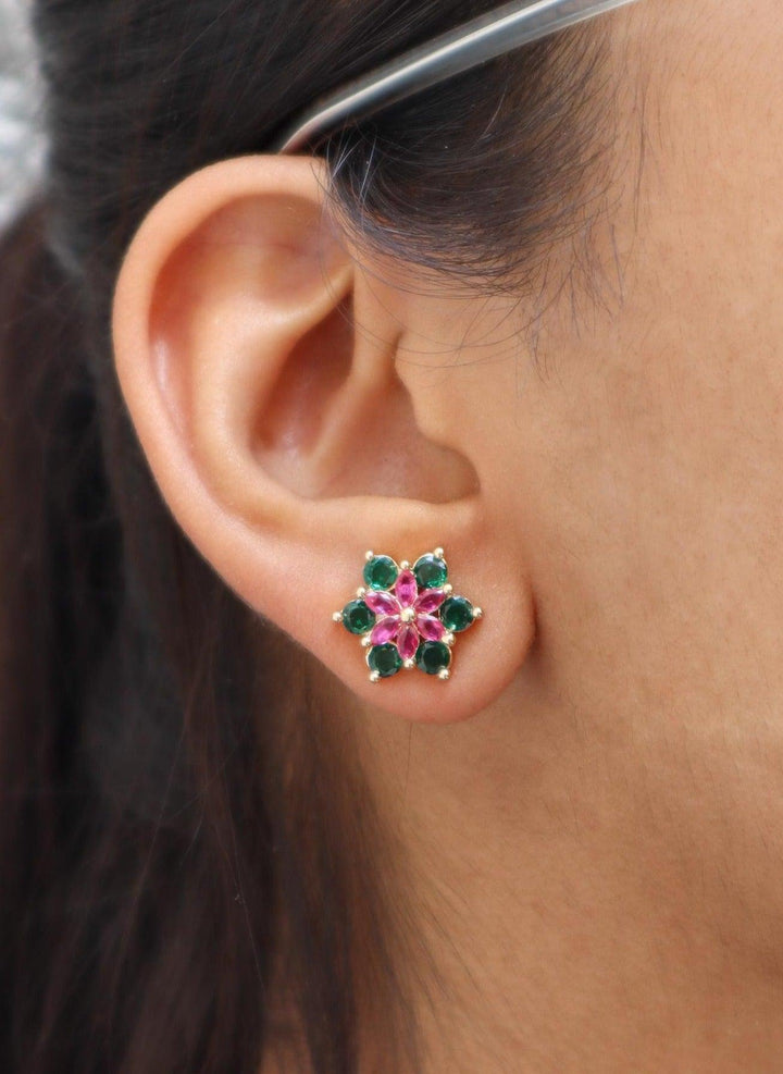 A closeup image of Emerald Floral Golden Earrings by Live Some India 