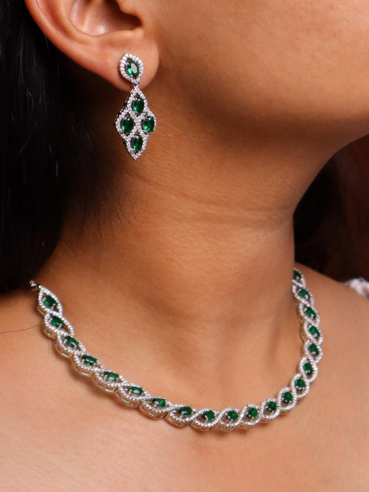 A closeup image of Emerald Knotted Diamond Necklace Set by Live Some India