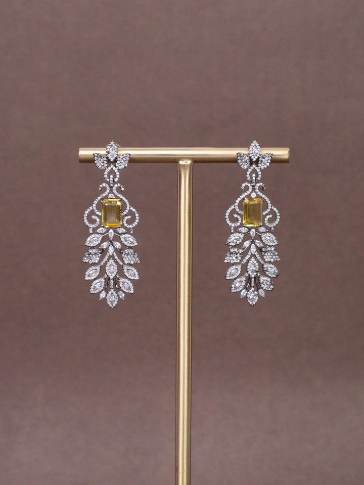 A closeup image of Emerging Doublet Diamond Earrings by Live Some India 