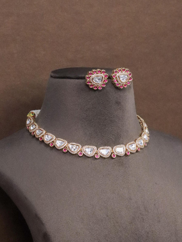 Esha Kundan Polki Ruby Necklace Set by Live Some India on a brown mannique