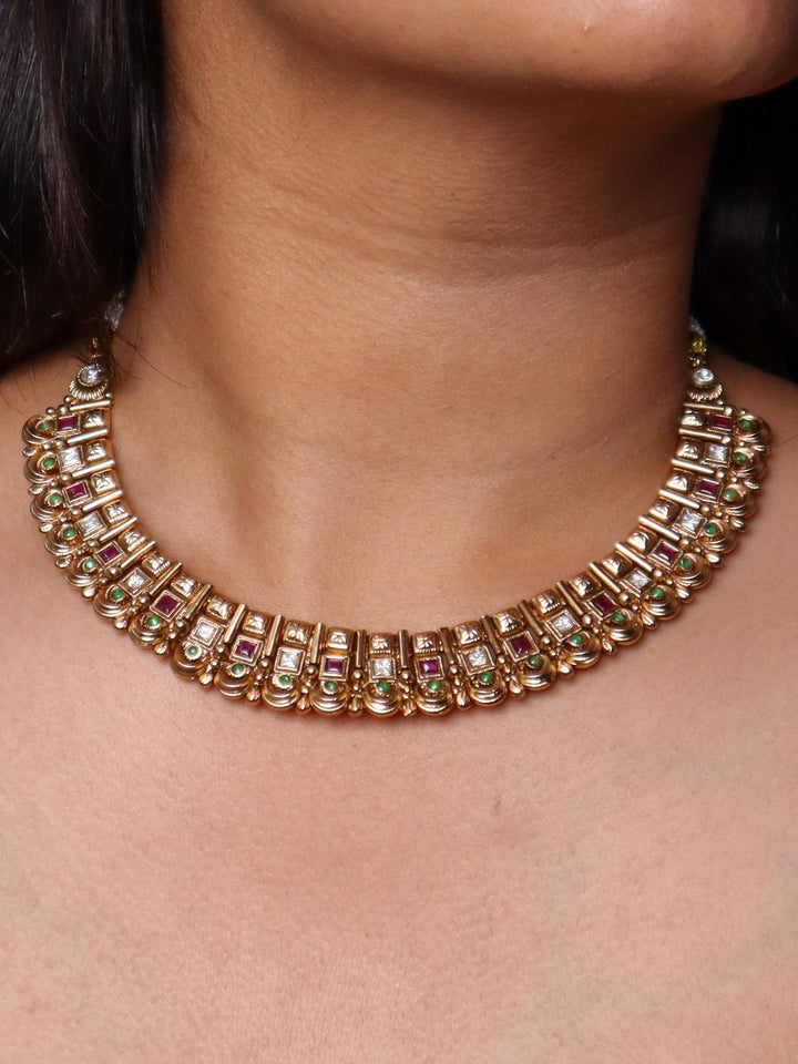 A closeup image of a girl wearing Exquisite 18K Gold Plated Necklace by Live Some India 