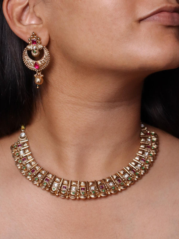 A closeup image of a girl wearing Exquisite 18K Gold Plated Necklace Set by Live Some India 