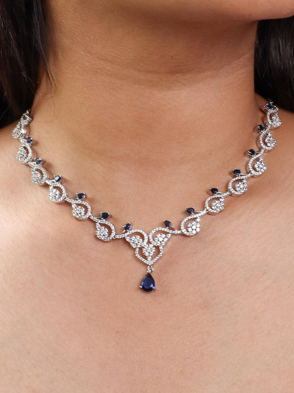 A closeup image of a girl wearing Floral Blue Sapphire Diamond Necklace Set by Live Some India 