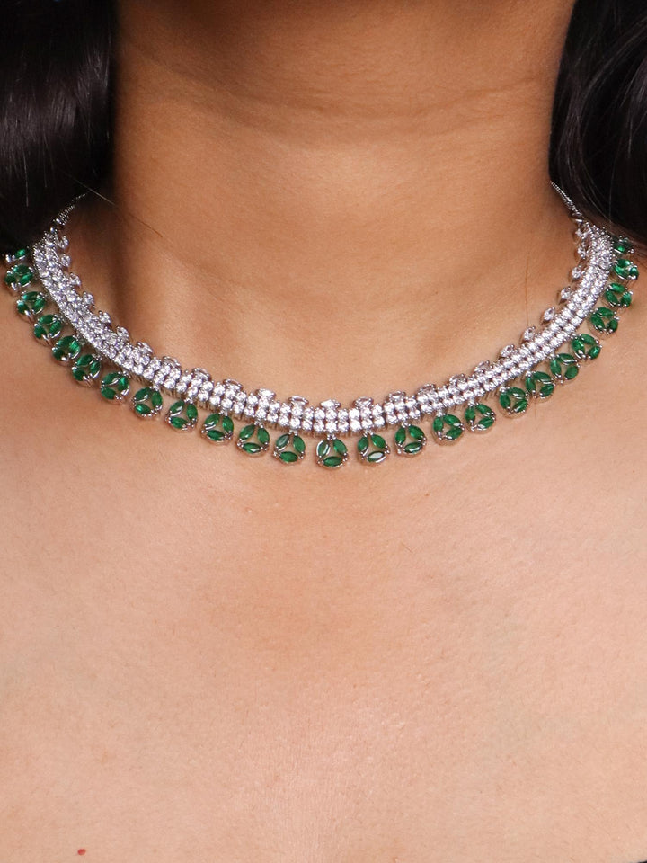 A closeup image of a girl wearing Floral Emerald Diamond Necklace Set -4 by Live Some India 