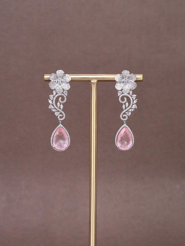 A closeup image of Floral Pink Doublet Diamond Earrings by Live Some India 