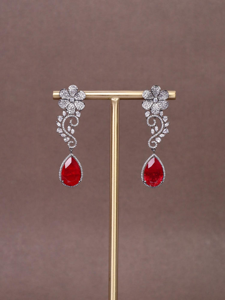 A closeup image of Floral Red Doublet Diamond Earrings by Live Some India 