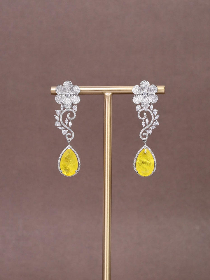 A closeup image of Floral Yellow Doublet Diamond Earrings by Live Some India 