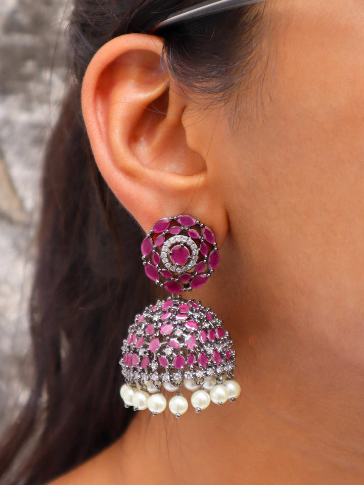 A closeup image of a girl wearing Ghoomar Contemporary Jhumka Earrings -3 by Live Some India 