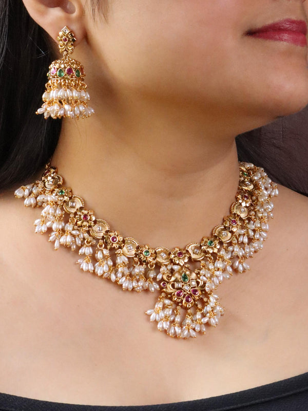 Girl wearing Designer Temple Necklace Set with Pearl Drops by Live Some India