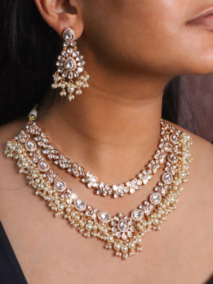 A closeup image of a girl wearing Glory Kundan Polki Necklace Set -1 by Live Some India 