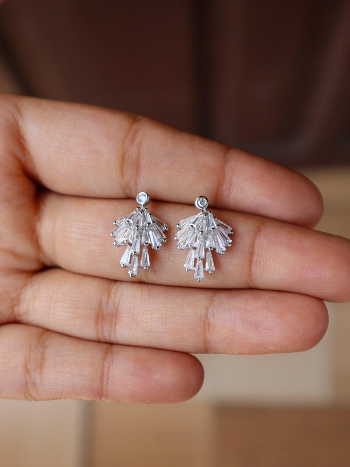 A closeup image of Glow Crystal Earrings -1 in Silver by Live Some India 