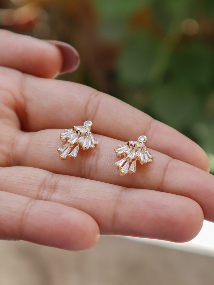 A closeup image of Glow Crystal Earrings -2 in Gold  by Live Some India 