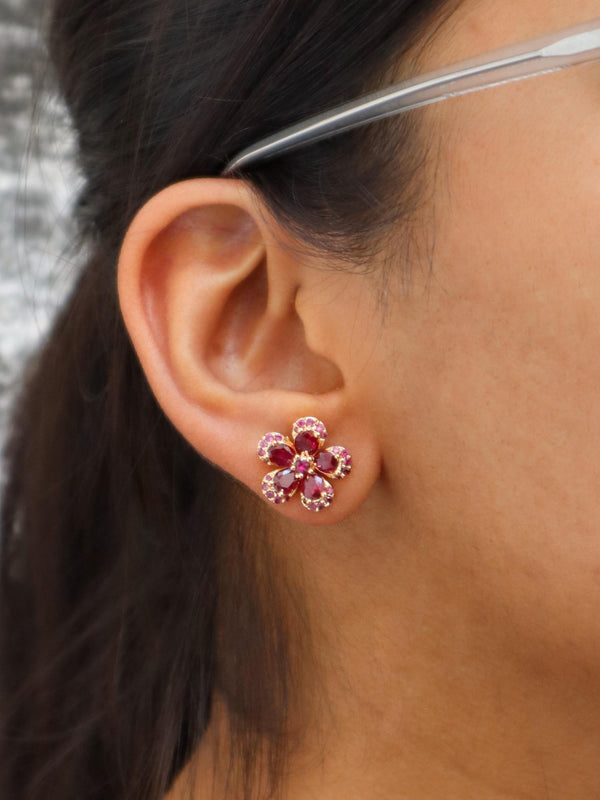 A closeup image of Gold Bordered Flower Earrings by Live Some India 