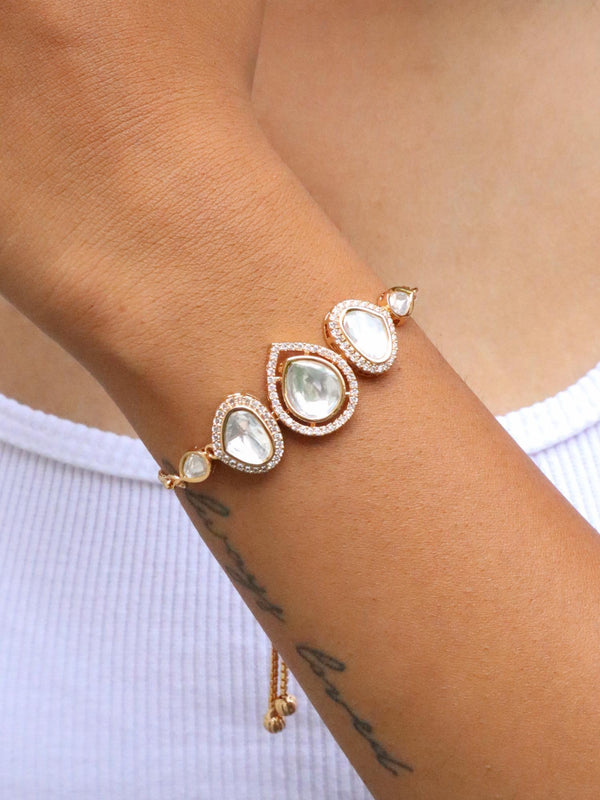 A closeup image of a girl wearing Graceful Kundan Polki Bracelet -3 by Live Some India 