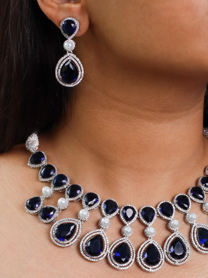 A closeup image of a girl wearing Grand Blue Sapphire Diamond Necklace Set -2 by Live Some India 