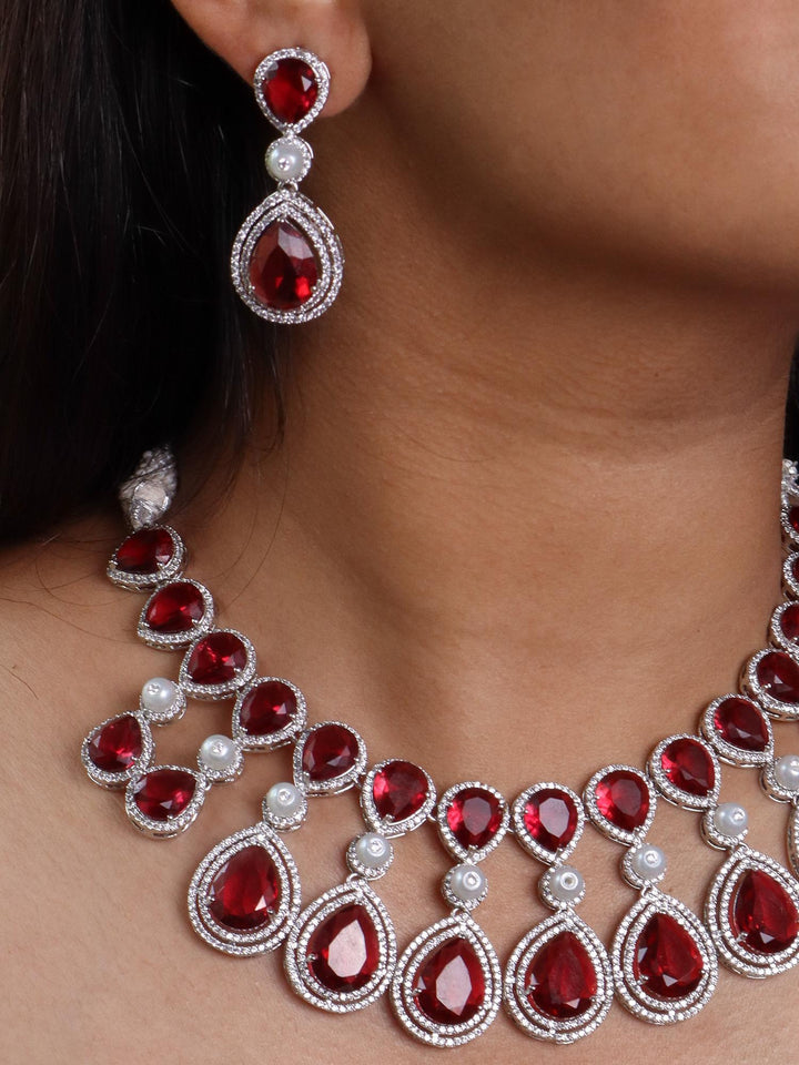 A closeup image of a girl wearing Grand Red Sapphire Diamond Necklace Set -1 by Live Some India 