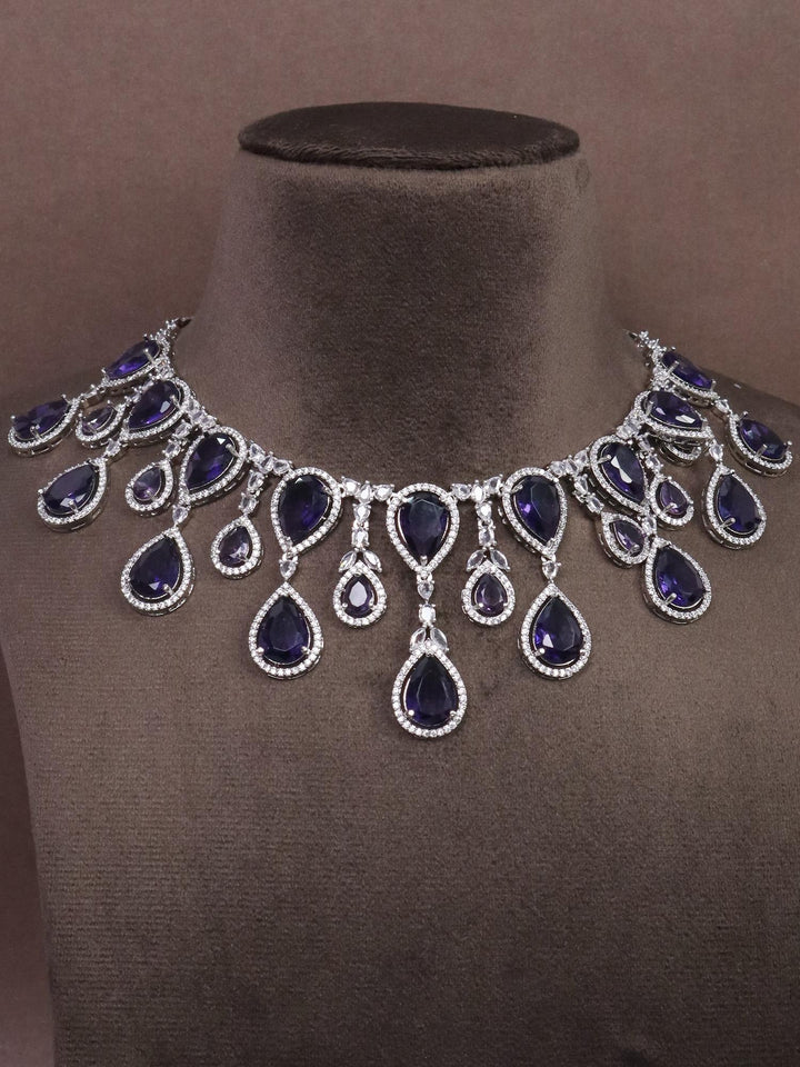 A closeup image of Grand Sapphire Diamond Necklace -1 by Live Some India on a brown dummy 