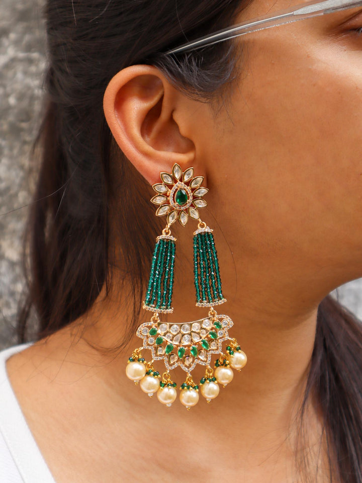 A closeup image of a girl wearing Green Beaded Kundan Polki Dangler Earrings -1 by Live Some India 