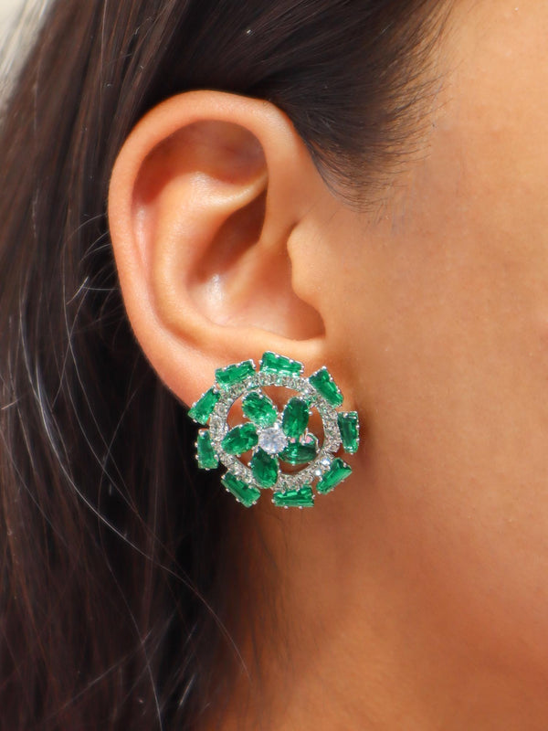 A closeup image of Green Chakra Diamond Earrings by Live Some India 