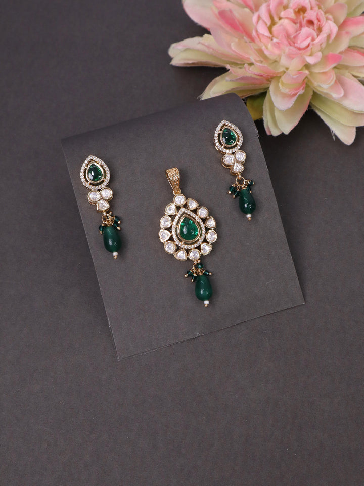 A closeup image of Green Pastel Pearl Drop Pendant Set by Live Some India on a black background