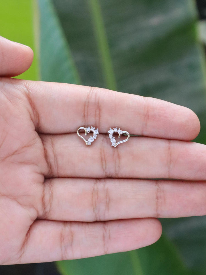 Half Diamond Heart Earrings by Live Some India on Natural Green leaves background