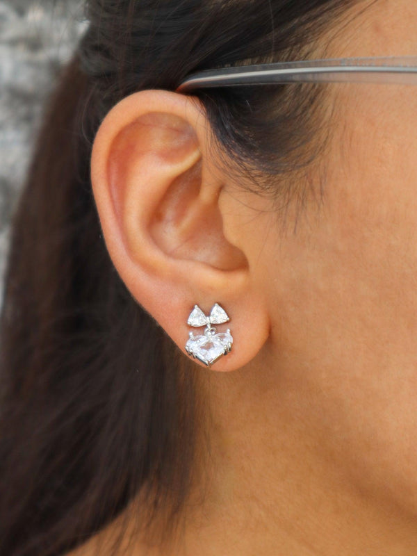 A closeup image of Heart Bow Earrings by Live some India 