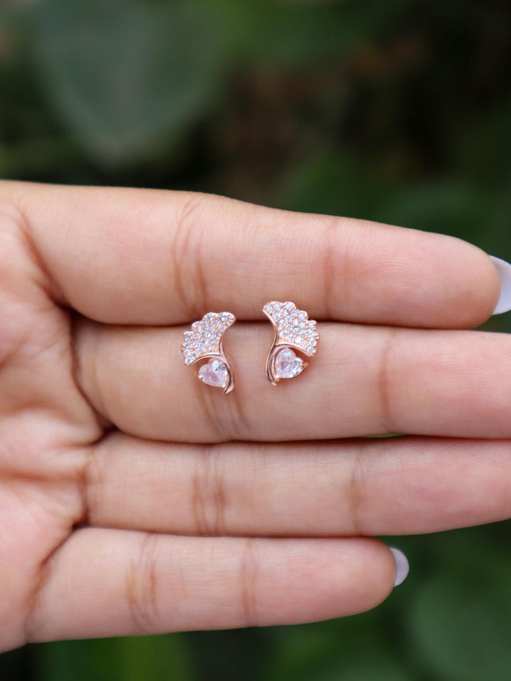 A closeup image of a girl wearing Heart on a Leaf Earrings -2 by Live Some India 