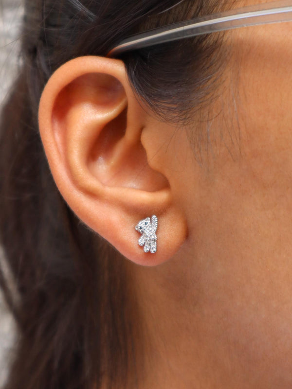 A closeup image of a girl wearing Hello Bear Earrings  by Live Some India 