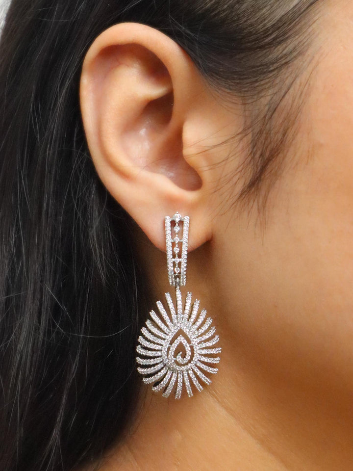 Girl wearing Ira Diamond Dangle Earrings by Live Some India