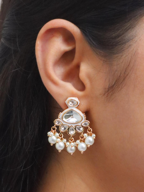 Girl wearing Iva Small Kundan Polki & Meenakari Earrings by live some india on her left ear