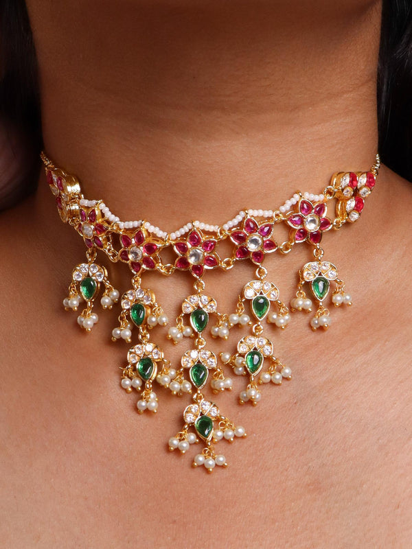 A closeup image of a girl wearing Jadau Kundan Polki Choker Necklace Set -3 by Live Some India 