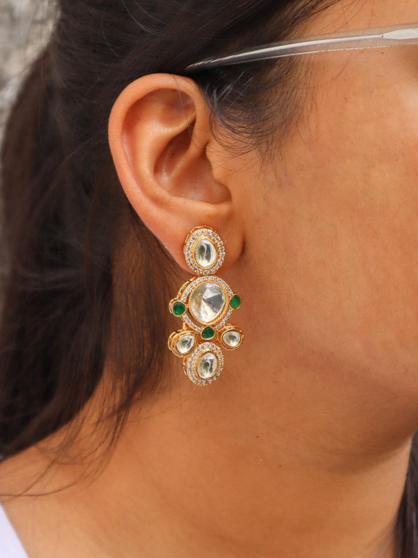 A closeup image of a girl wearing Jiya Kundan Polki Dangler Earrings -1 by Live Some India 