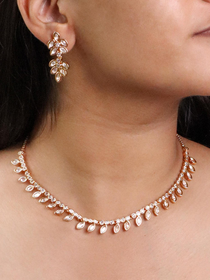 A closeup image of a girl wearing Kavya Diamond Necklace Set by Live Some India 