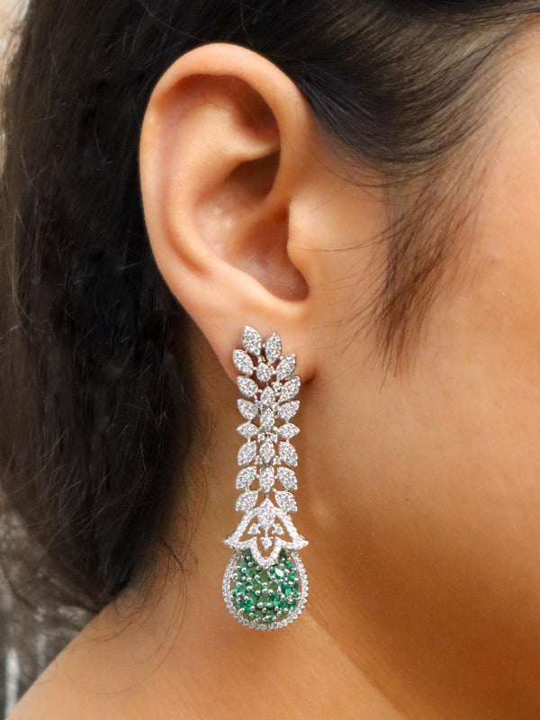 Girl wearing Kiara Designer Emerald Green Diamond Dangle Earrings by Live Some India